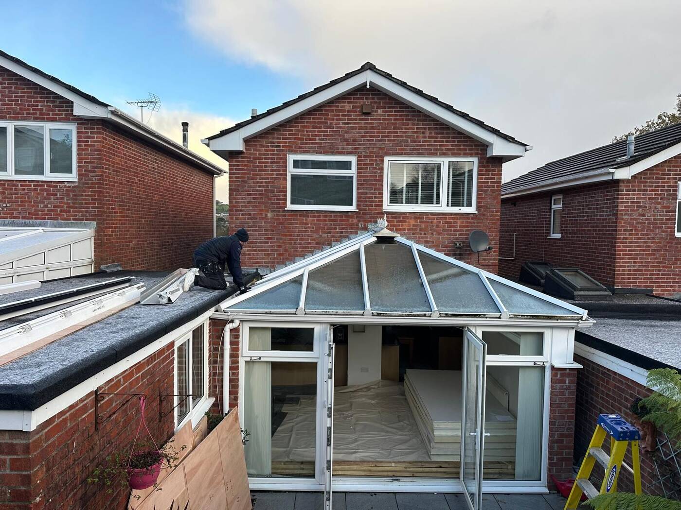 Old polycarbonate conservatory roof before replacement